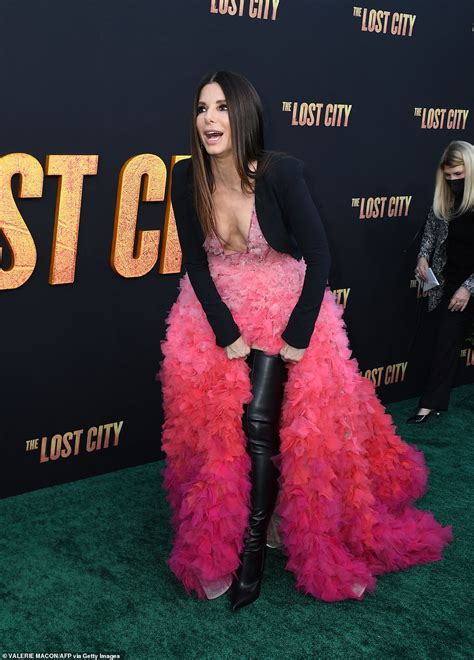 sandra bullock leather|Sandra Bullock, 57, dons plunging pink ombré gown。